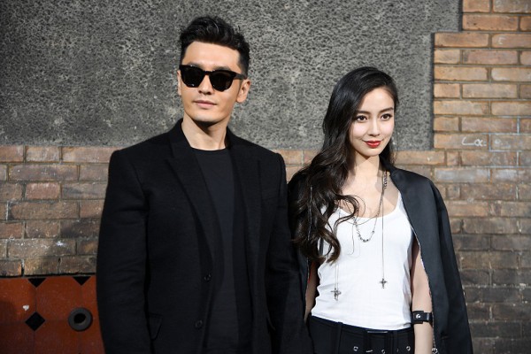  Huang Xiaoming and Angelababy attend the Givenchy Menswear Spring/Summer 2017 show as part of Paris Fashion Week on June 24, 2016 in Paris, France.