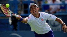 Japan's Kei Nishikori defeated Milos Raonic in five sets that lasted 4 hours and 29 minutes at the US Open in Flushing Meadows