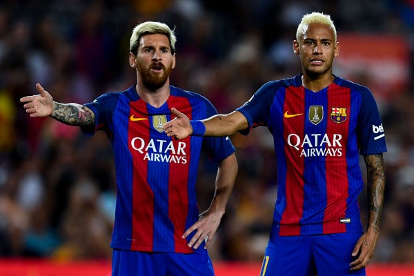 Barcelona winger Neymar (R) with teammate Lionel Messi