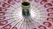 Chinese currency touched its lowest level in six years against dollar during early Monday morning session. 