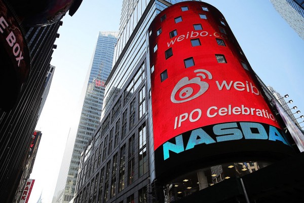 The Nasdaq exchange advertises China's Weibo in Times Square moments before it began trading on the Nasdaq exchange under the ticker symbol WB on April 17, 2014 in New York City. 