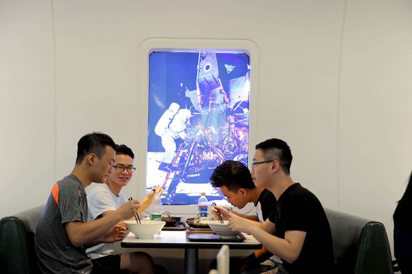 Students eat at a cabin-style canteen in the Nanjing University of Aeronautics and Astronautics on August 30, 2016 in Nanjing, Jiangsu Province of China. 