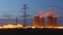 The four cooling towers and two reactor blocks of the Temelin nuclear power plant stand illuminated on August 11, 2011 near Temelin, Czech Republic.
