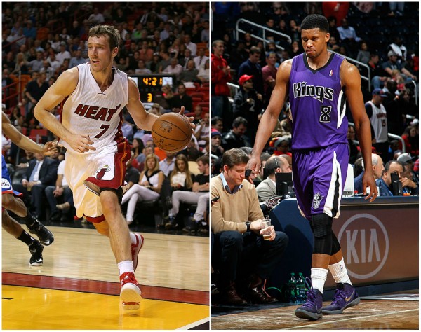 Miami Heat's Goran Dragic (L) and Sacramento Kings' Rudy Gay.