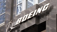 The Boeing logo hangs on the corporate world headquarters building of Boeing November 28, 2006 in Chicago, Illinois.