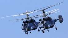 In this handout image supplied by Host photo agency / RIA Novosti, Ka-27PL helicopters during a rehearsal of the military parade to mark the 70th anniversary of Victory in the 1941-1945 Great Patriotic War, May 7, 2015 in Baltiysk, Russia. 