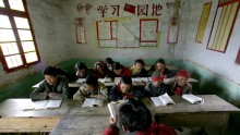  Tibetan students attend a class at the Xiangnong primary school