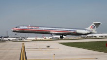 An American Airlines jet lands at O'Hare International Airport on September 19, 2014 in Chicago, Illinois.