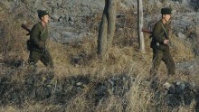 North Korean soldiers near their country's border with China.